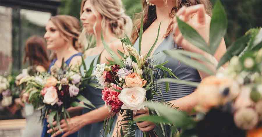 Bridesmaid holding flowers